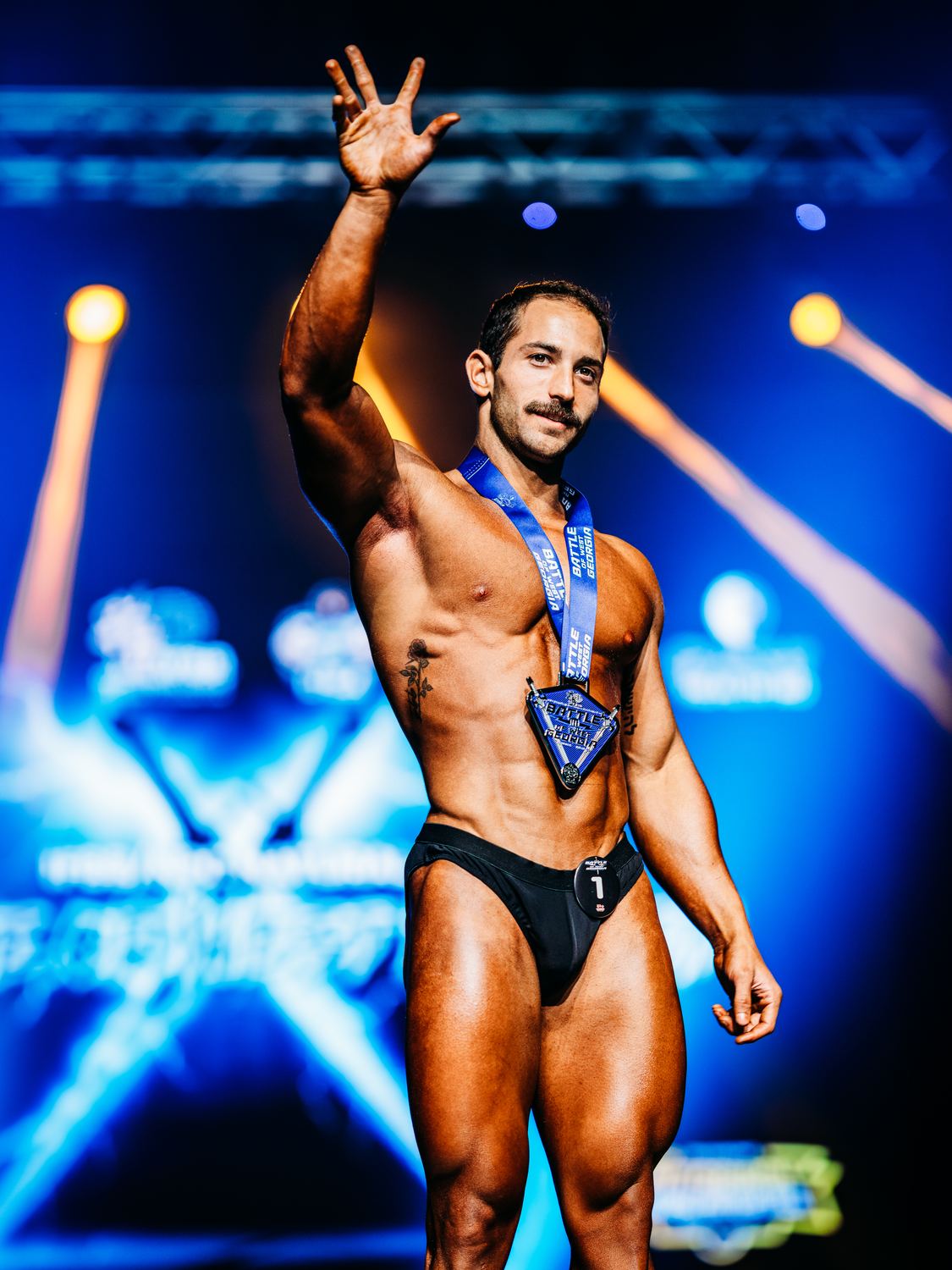 Jeremy Womack, founder of JTrainFit, on stage at Battle of West Georgia 2026